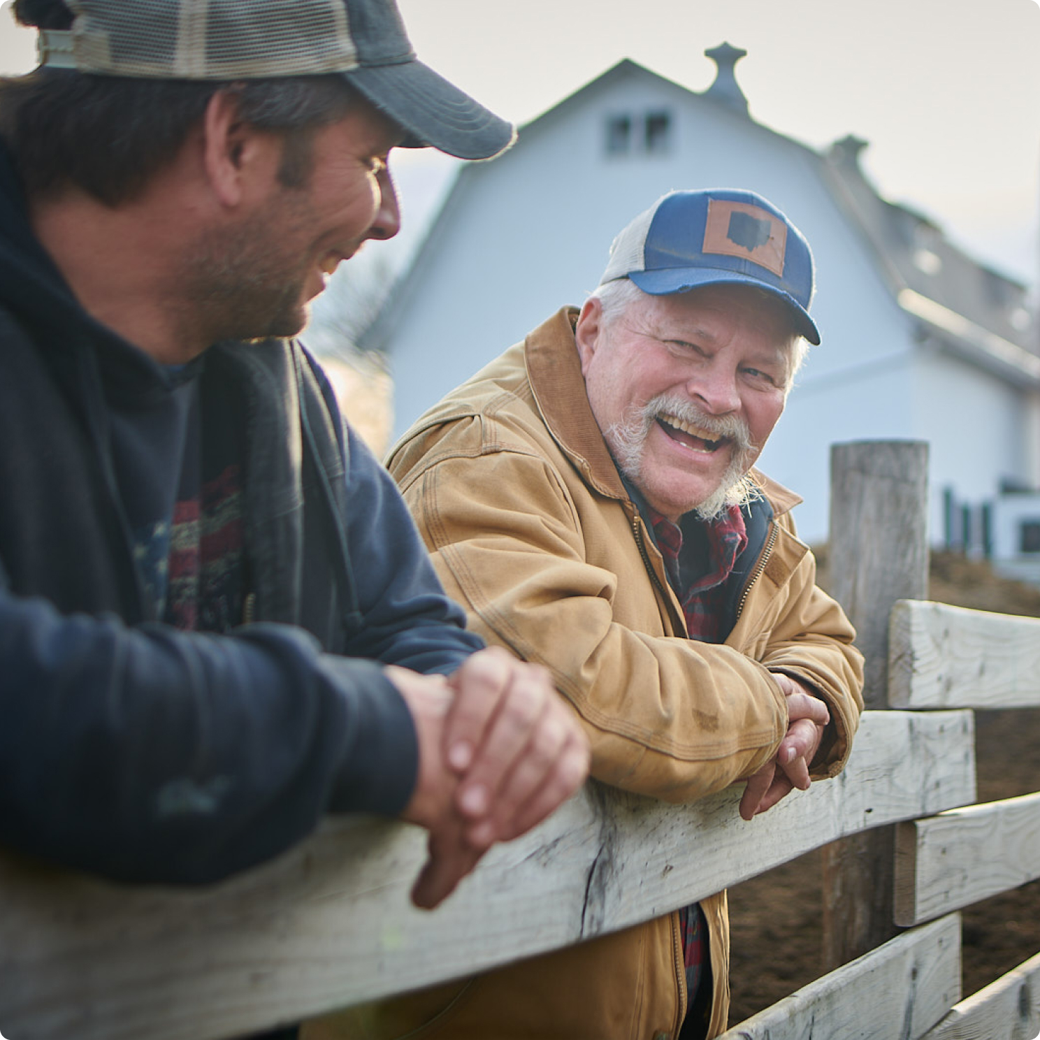 Grandfather and son on the farm fence – Kettering Health