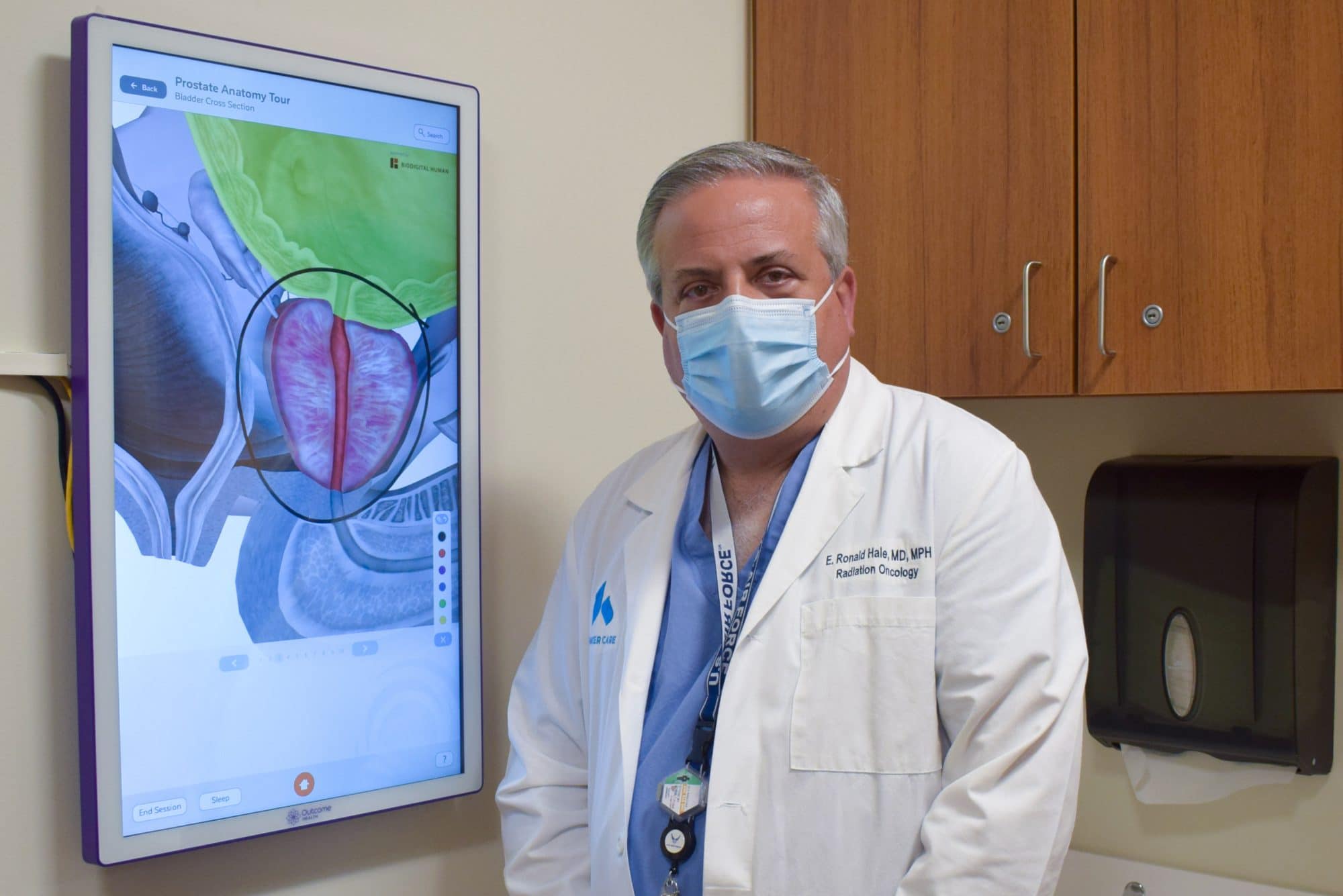 Dr. Hale standing at screen showing prostate