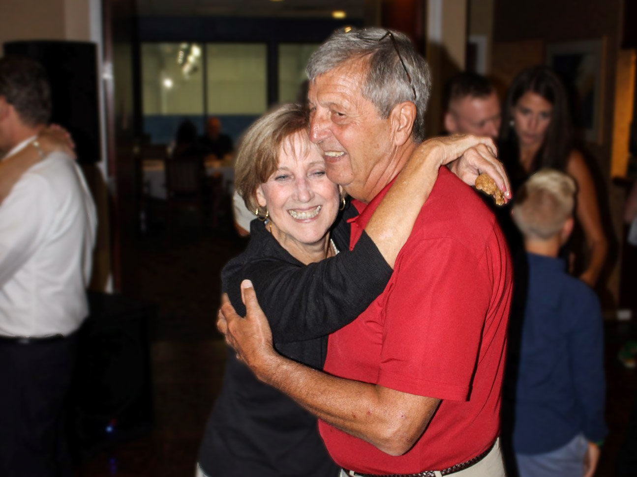 Fred Willits dances with his wife