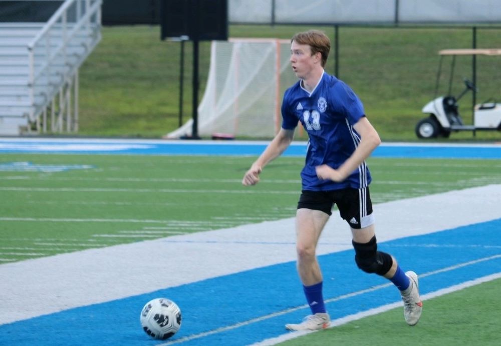 Ethan Shock plays soccer after knee surgery