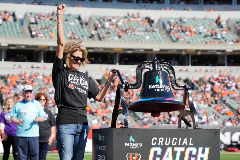 Cancer survivor rings bell at Crucial Catch Bengals game